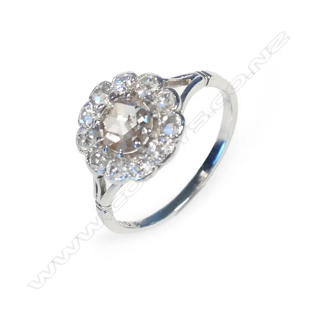 An antique platinum and diamond ring Image 1++