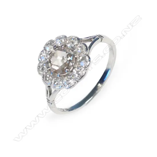 An antique platinum and diamond ring