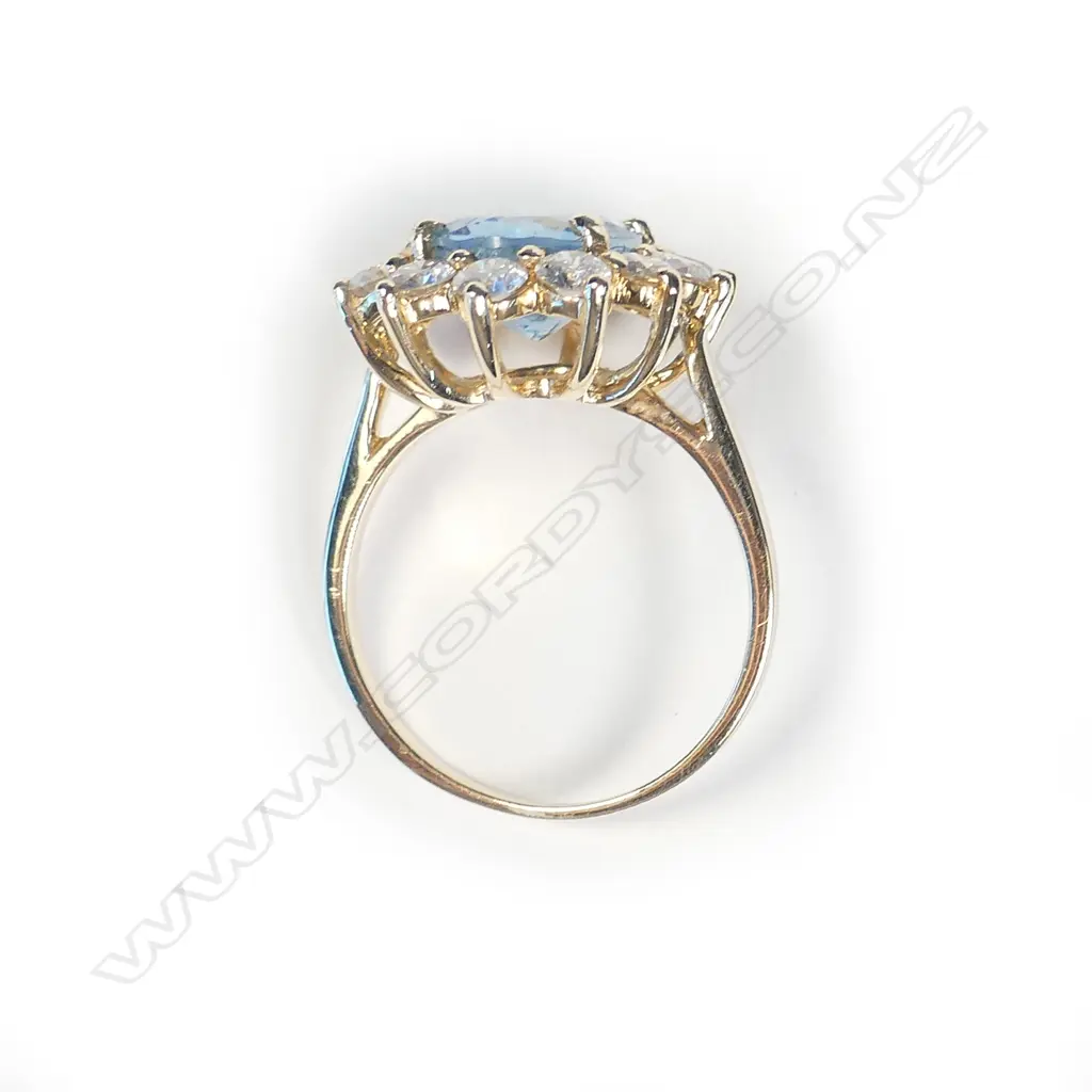 A 14ct gold aquamarine and diamond ring Image 1++
