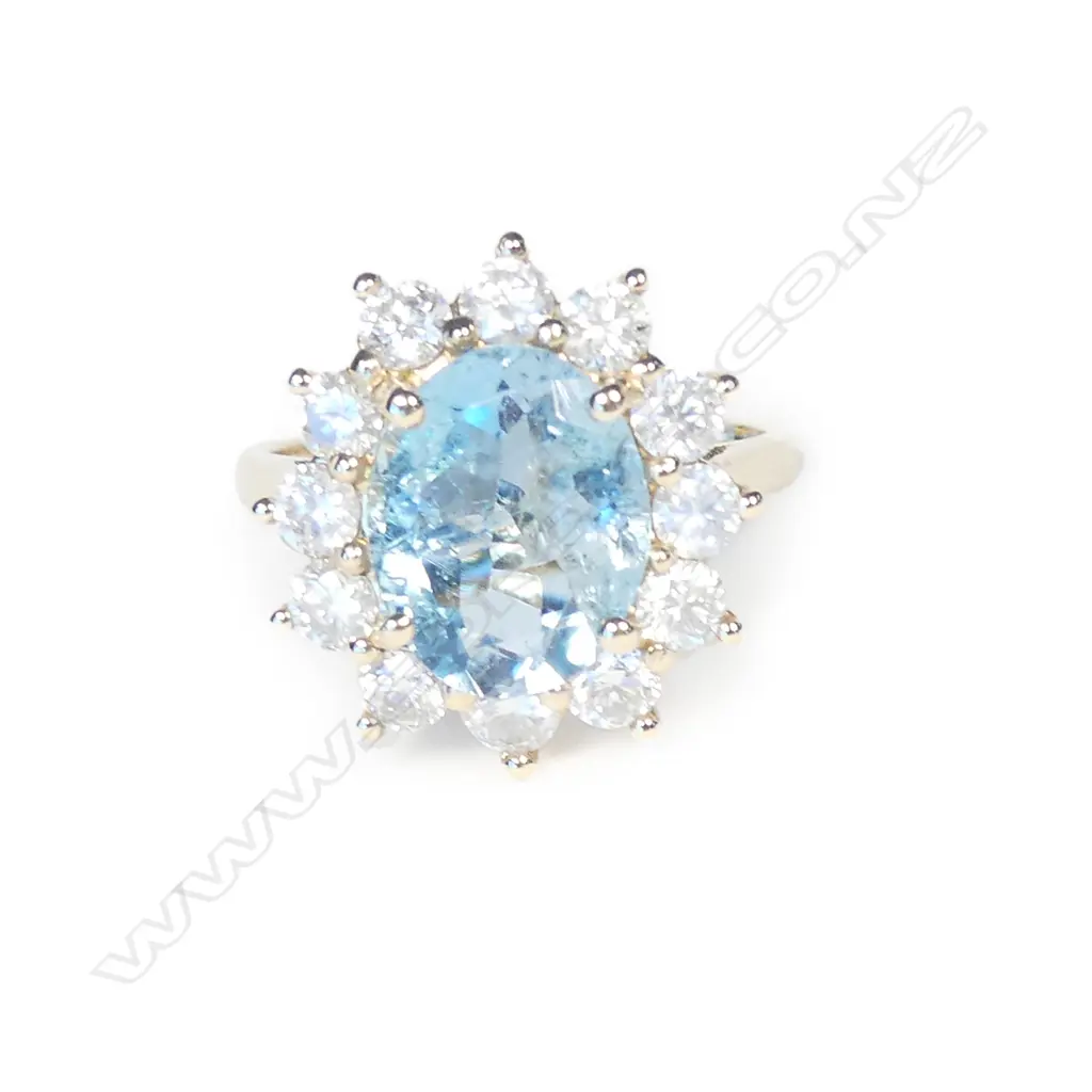 A 14ct gold aquamarine and diamond ring Image 1++