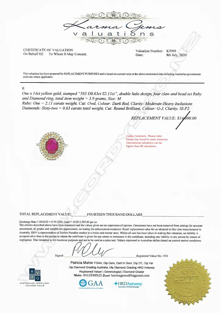 A 14ct white gold ruby and diamond halo ring Image 1++