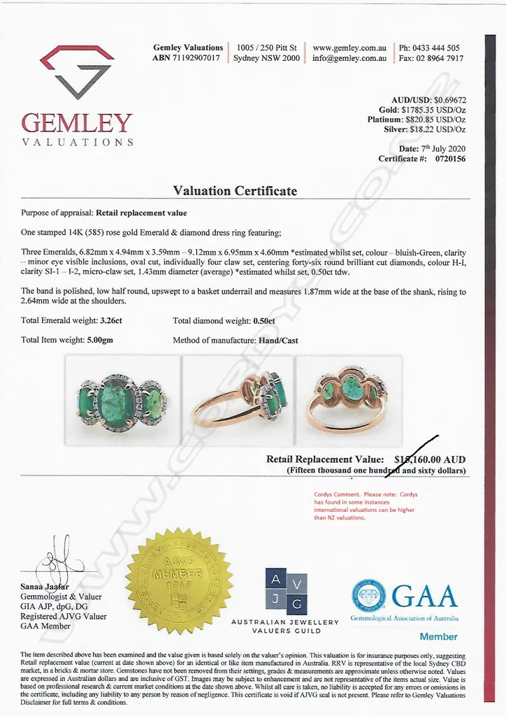 A 14ct rose gold emerald and diamond trilogy ring Image 1++