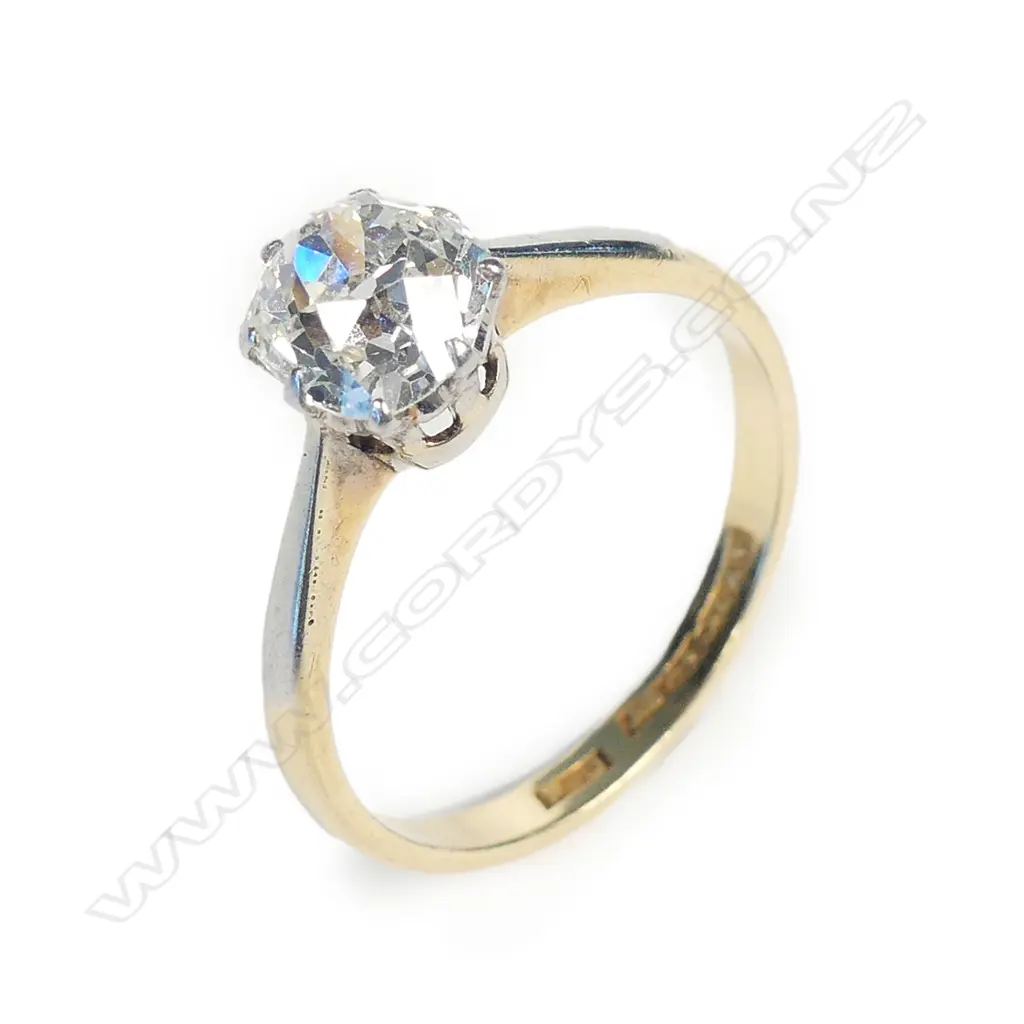 An estate 18ct gold and diamond solitaire ring Image 1++