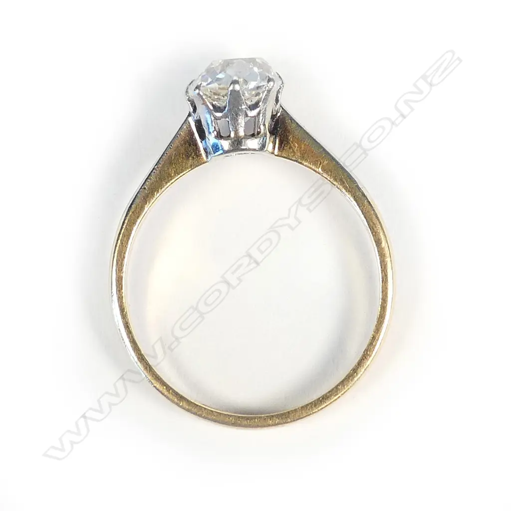 An estate 18ct gold and diamond solitaire ring Image 1++
