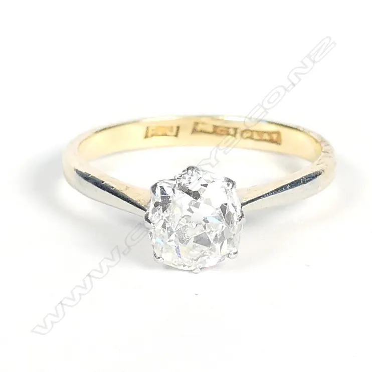 An estate 18ct gold and diamond solitaire ring Image 1++