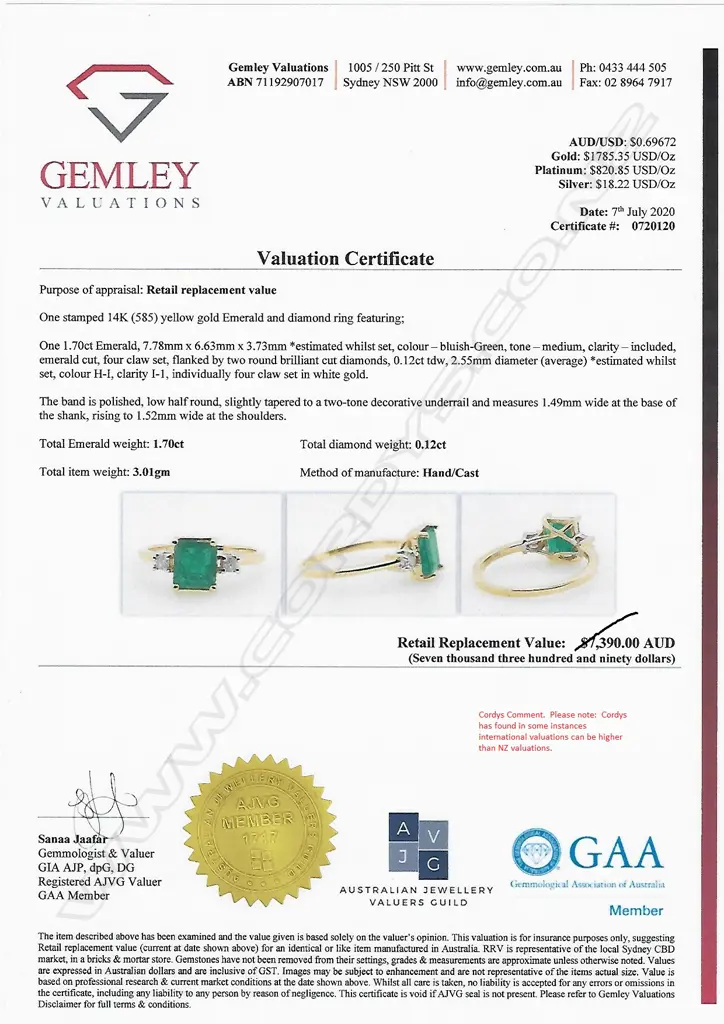 A 14ct gold emerald and diamond ring Image 1++