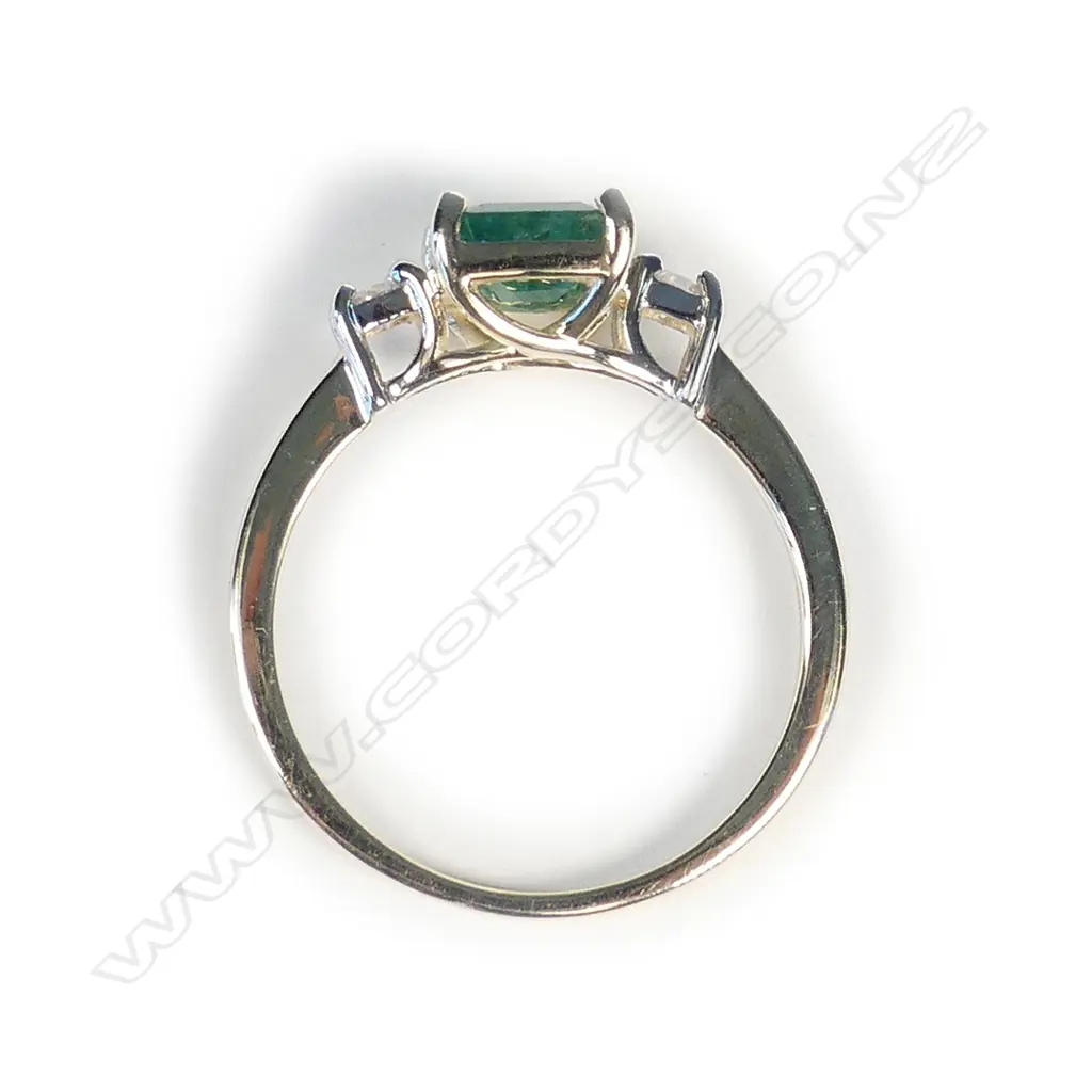 A 14ct gold emerald and diamond ring Image 1++