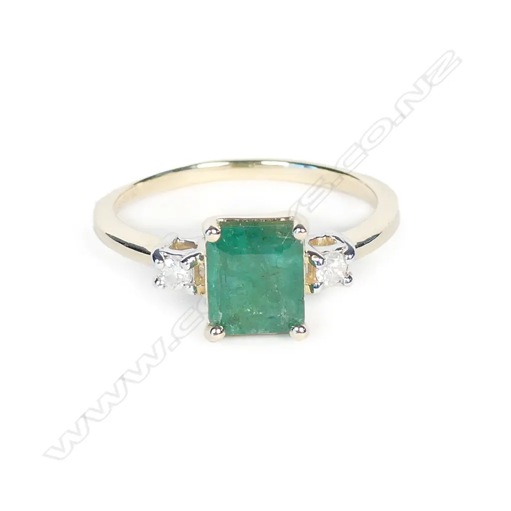 A 14ct gold emerald and diamond ring Image 1++