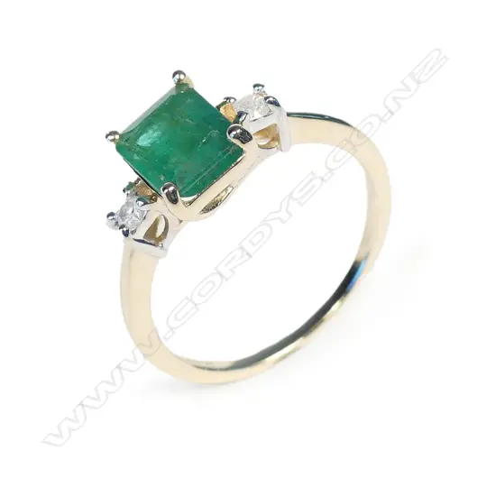 A 14ct gold emerald and diamond ring