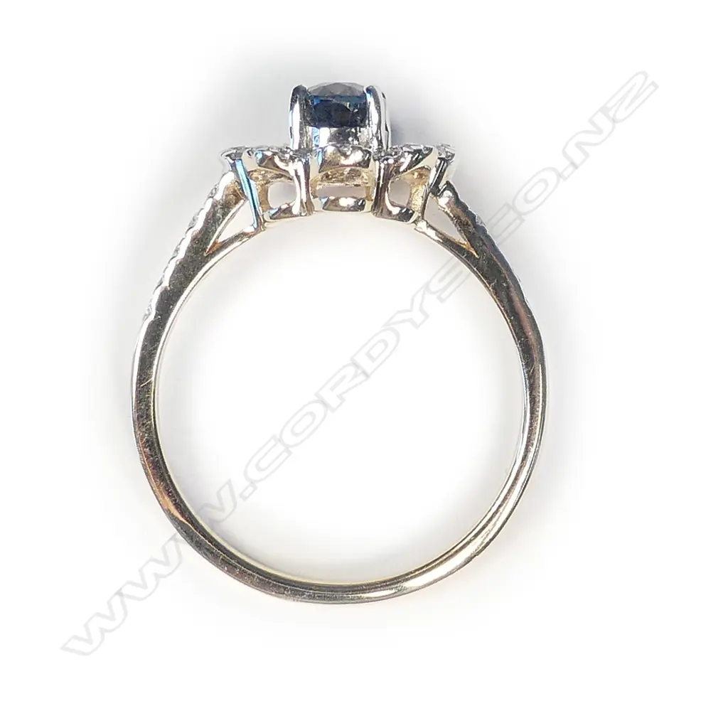 A 14ct gold sapphire and diamond ring Image 1++