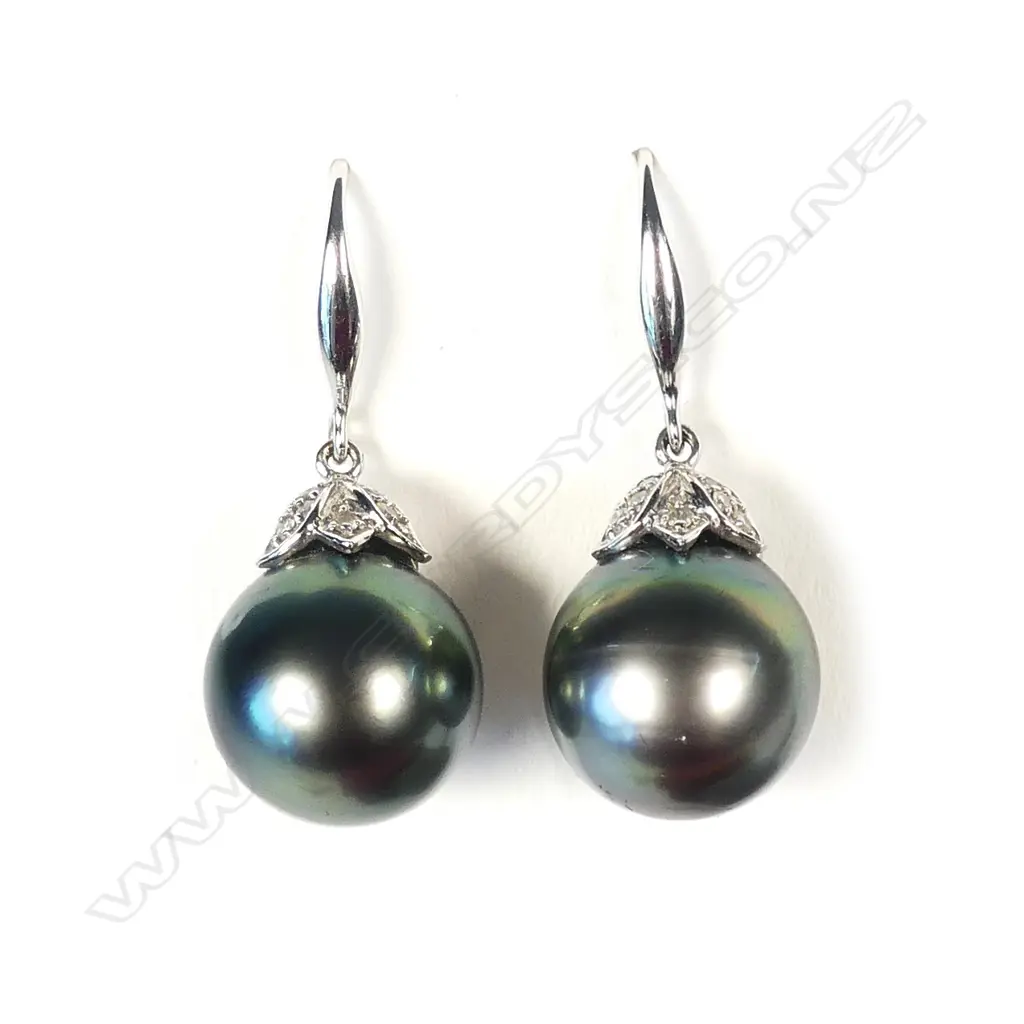 A pair of 18ct white gold and black pearl earrings Image 1++