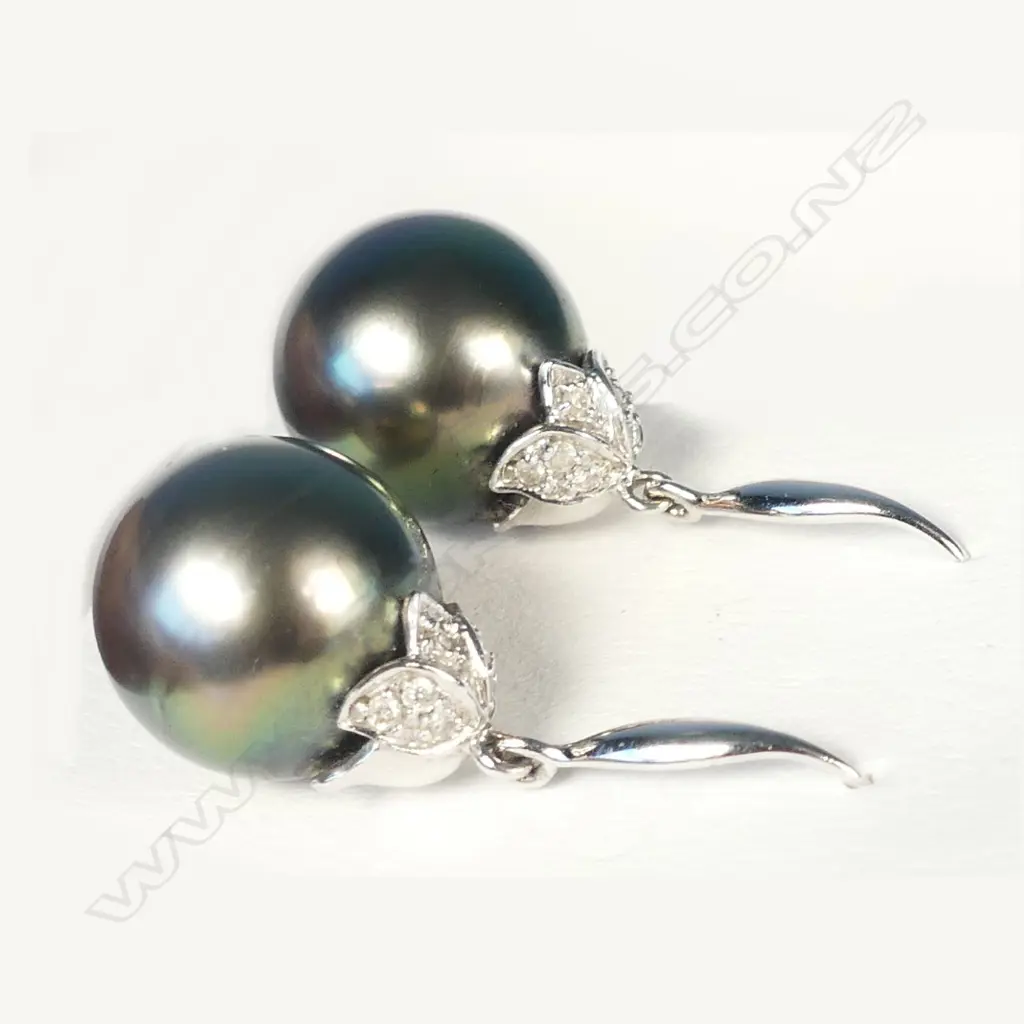 A pair of 18ct white gold and black pearl earrings Image 1++