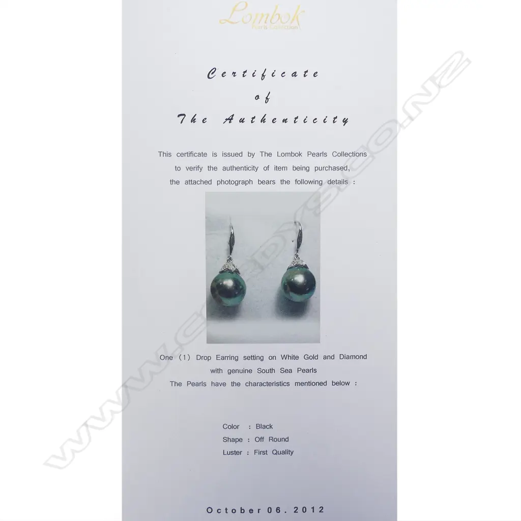 A pair of 18ct white gold and black pearl earrings Image 1++