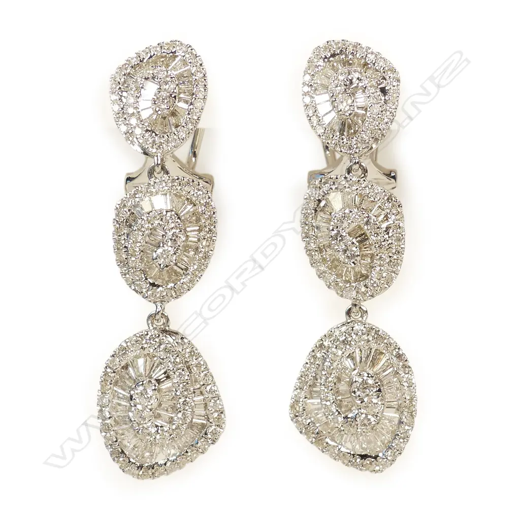 A pair of modern 18ct. white gold and diamond retro stylised triple chandelier drop earrings Image 1++