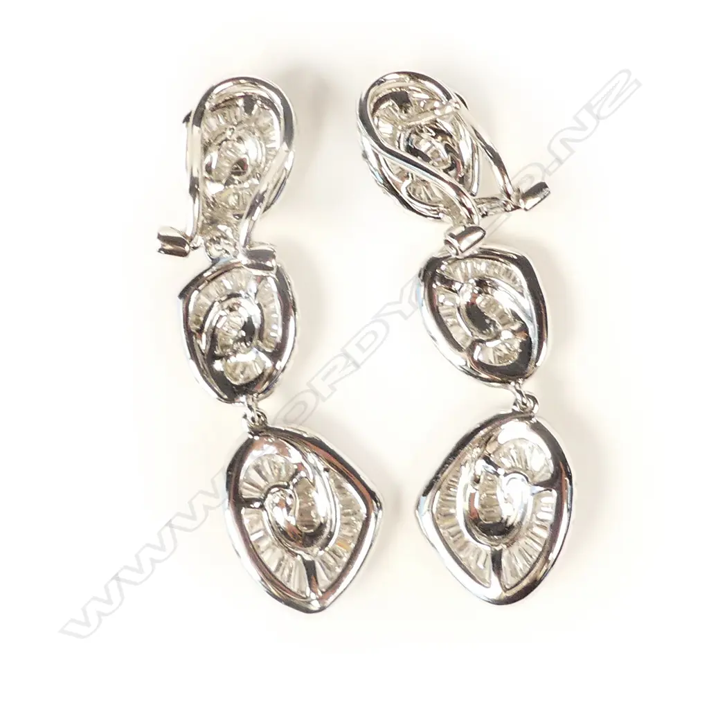 A pair of modern 18ct. white gold and diamond retro stylised triple chandelier drop earrings Image 1++