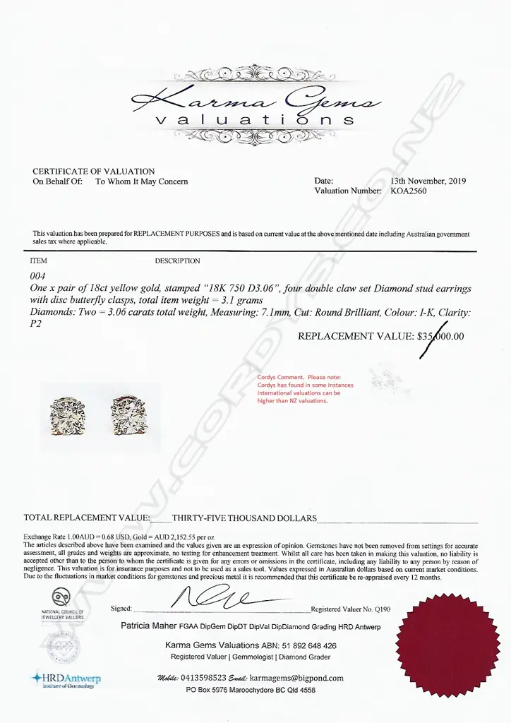 A pair of 18ct gold and diamond stud earrings Image 1++