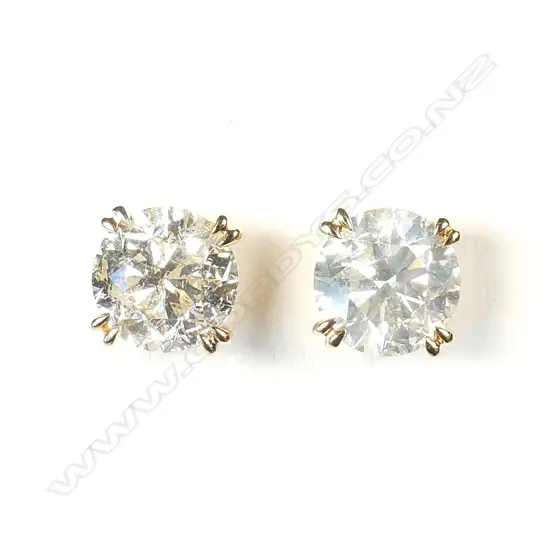 A pair of 18ct gold and diamond stud earrings