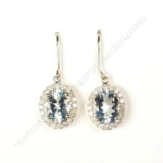 A pair of 14ct gold aquamarine and diamond earrings