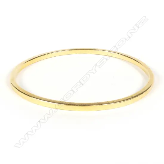 A heavy 22ct yellow gold bangle