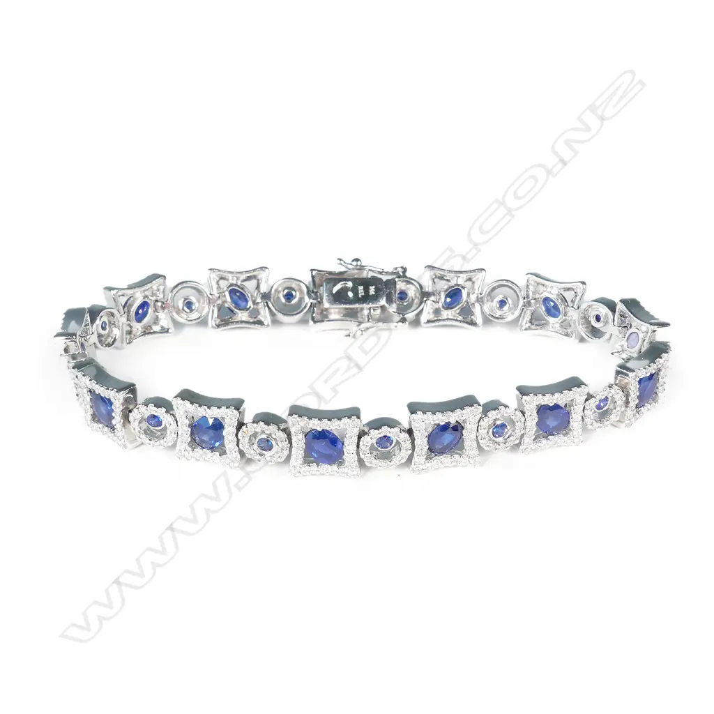 A stylish 14ct white gold diamond and sapphire bracelet Image 1++