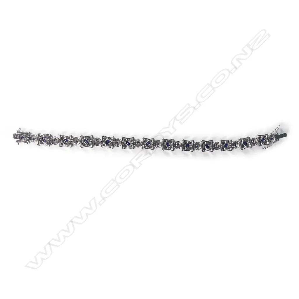 A stylish 14ct white gold diamond and sapphire bracelet Image 1++