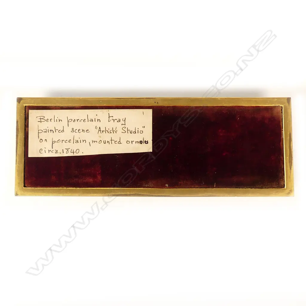 A finely painted Berlin porcelain ormolu framed paperweight Image 1++