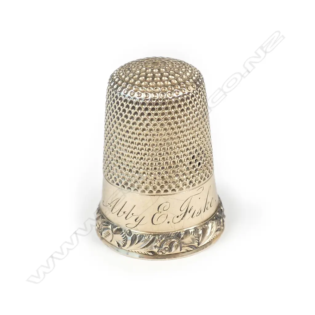 A gold plated thimble Image 1++