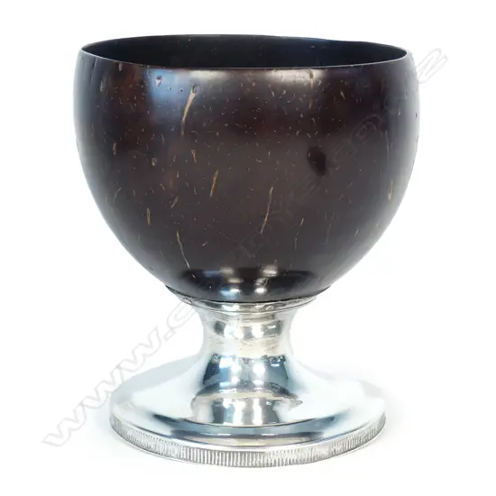 A George III silver mounted coconut cup