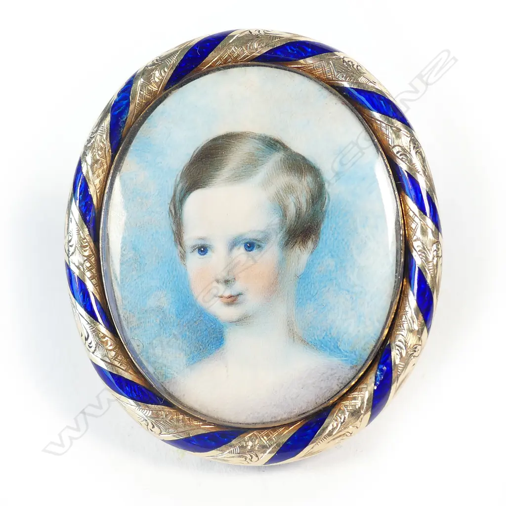 An early 19thC gold and enamelled framed portrait miniature of a young boy Image 1++