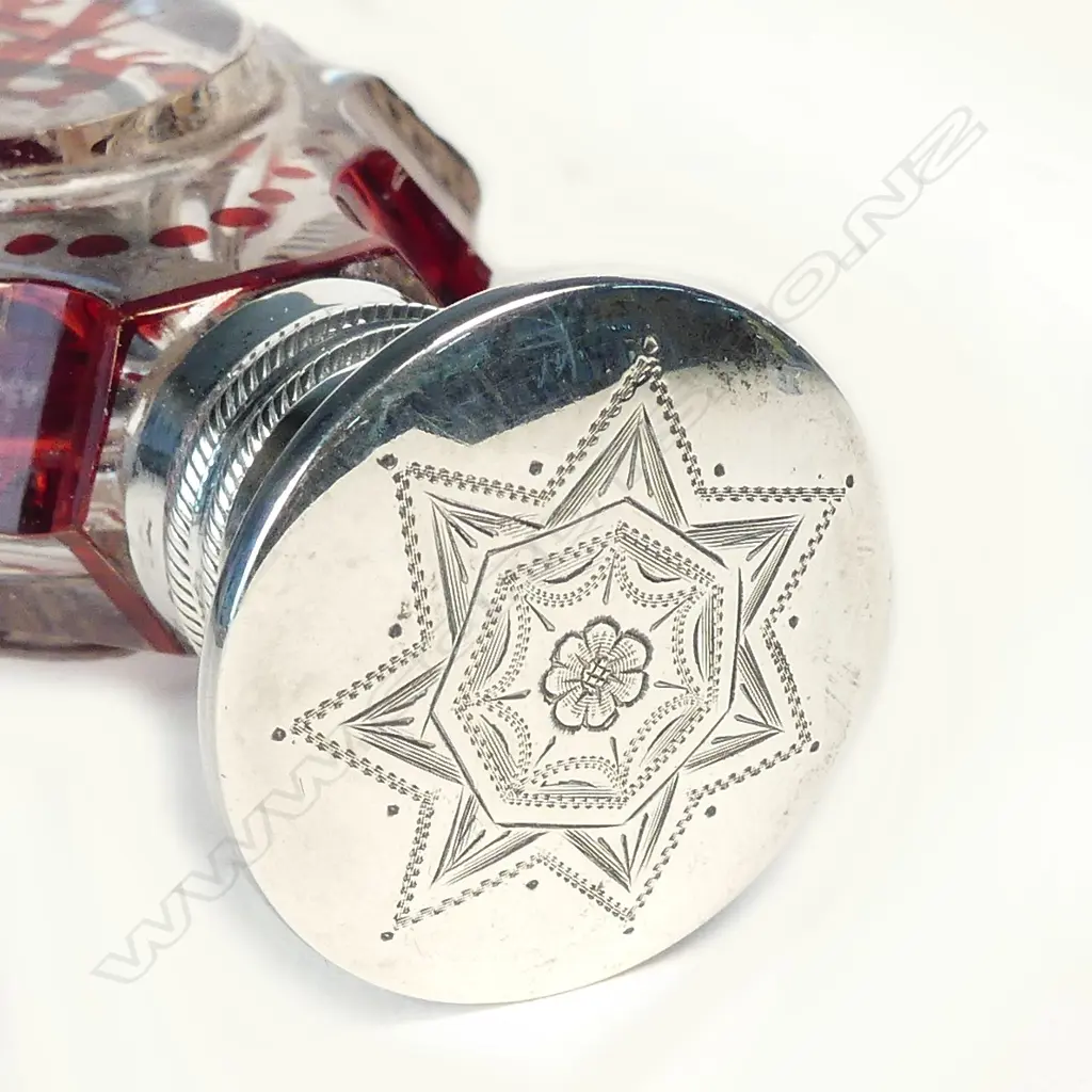 A 19thC French silver topped ruby flashed clear glass scent bottle Image 1++