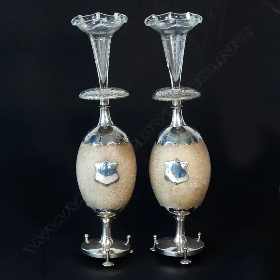 An impressive pair of 19thC colonial silver mounted emu egg epergnes