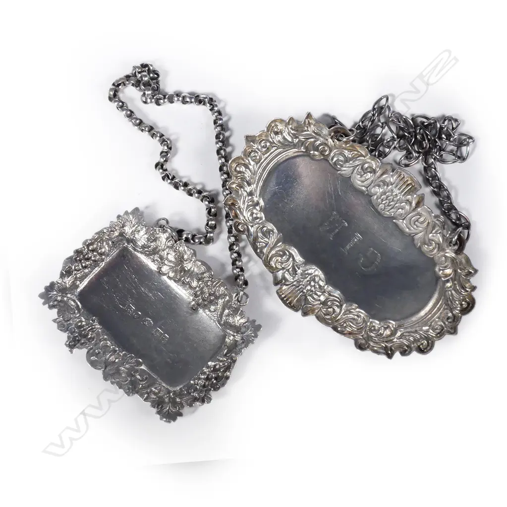 Two silver bottle tickets Image 1++