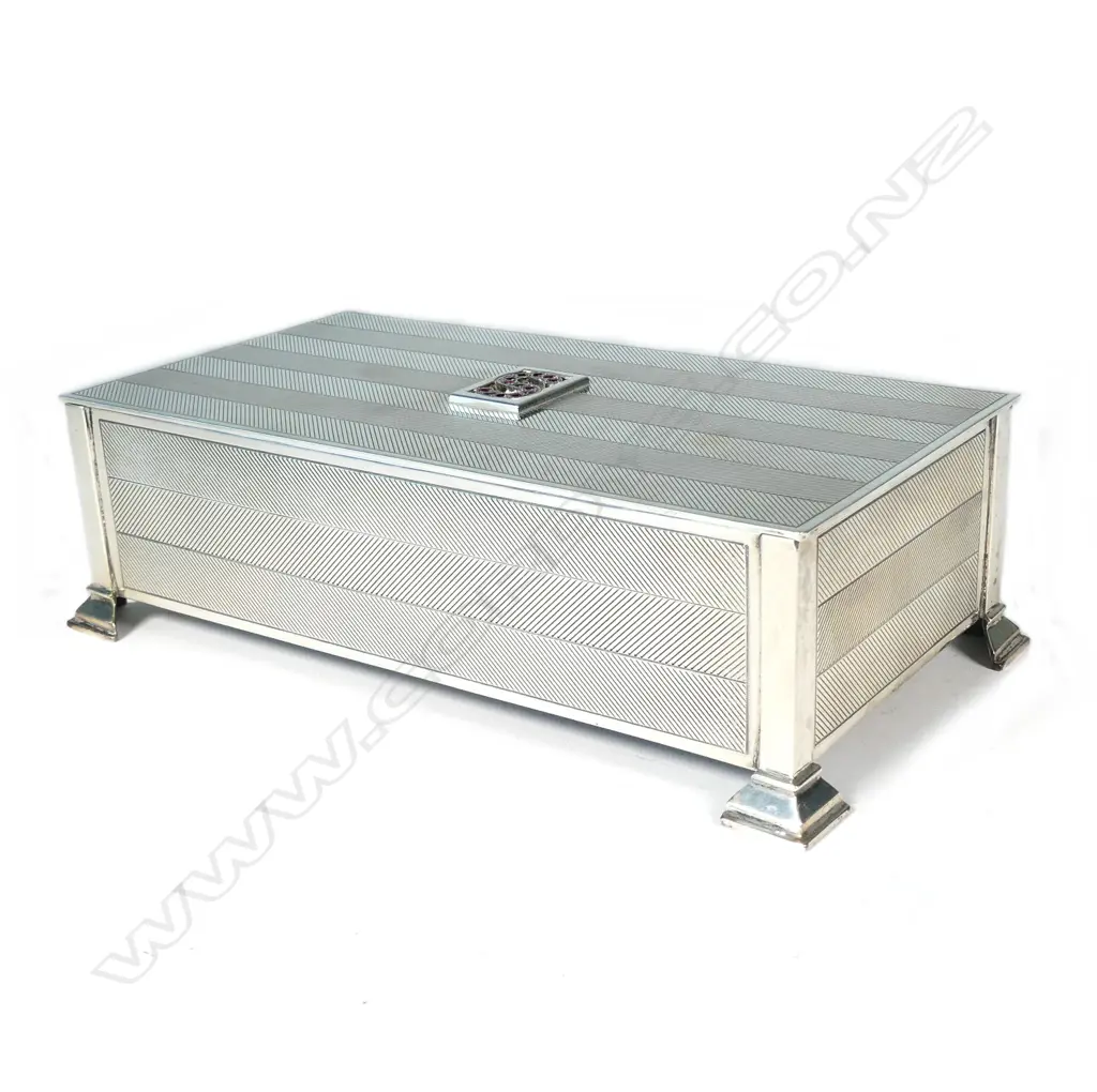 A mid 20thC silver cigarette box Image 1++