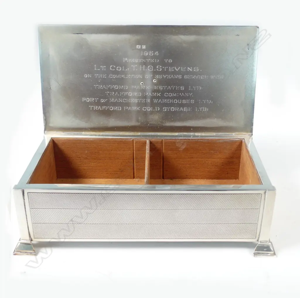 A mid 20thC silver cigarette box Image 1++