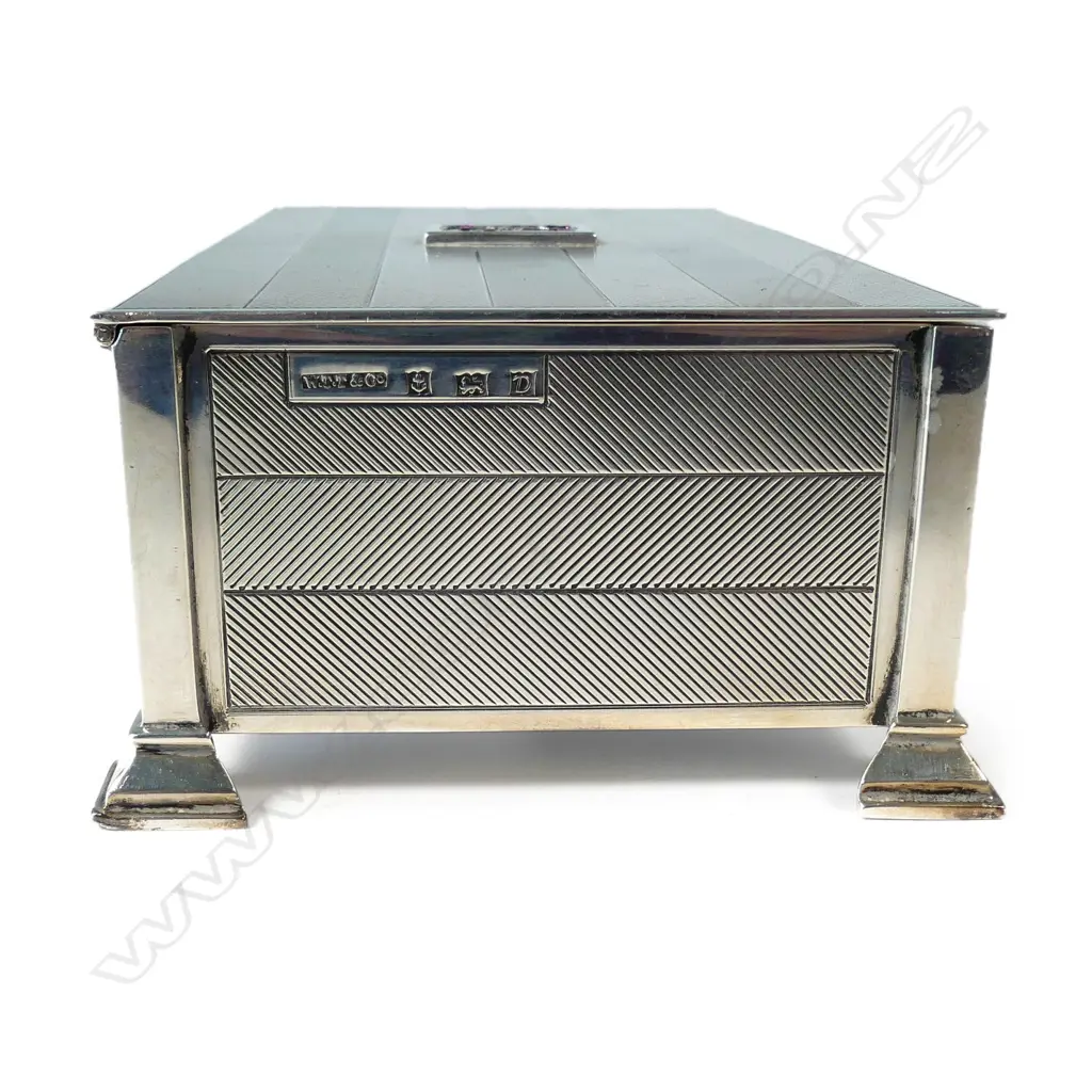 A mid 20thC silver cigarette box Image 1++