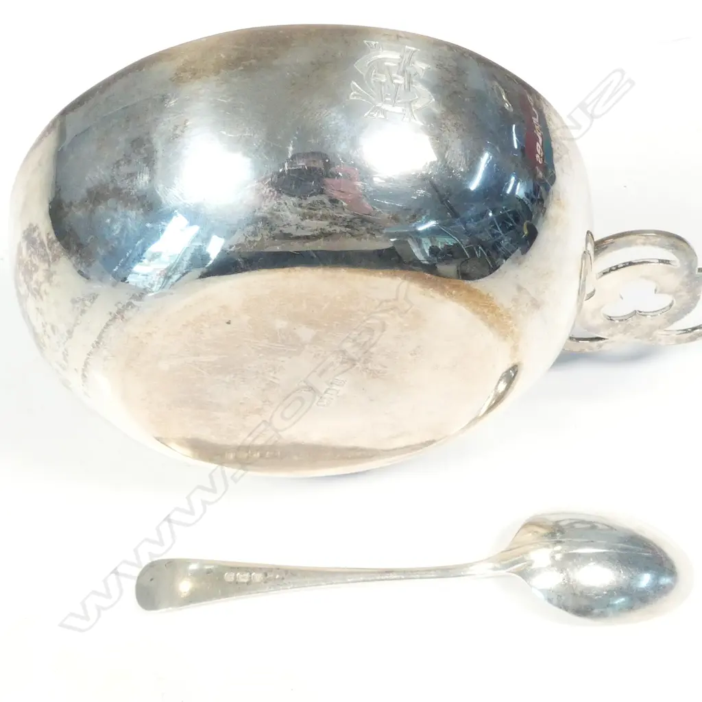 A silver porringer and spoon Image 1++