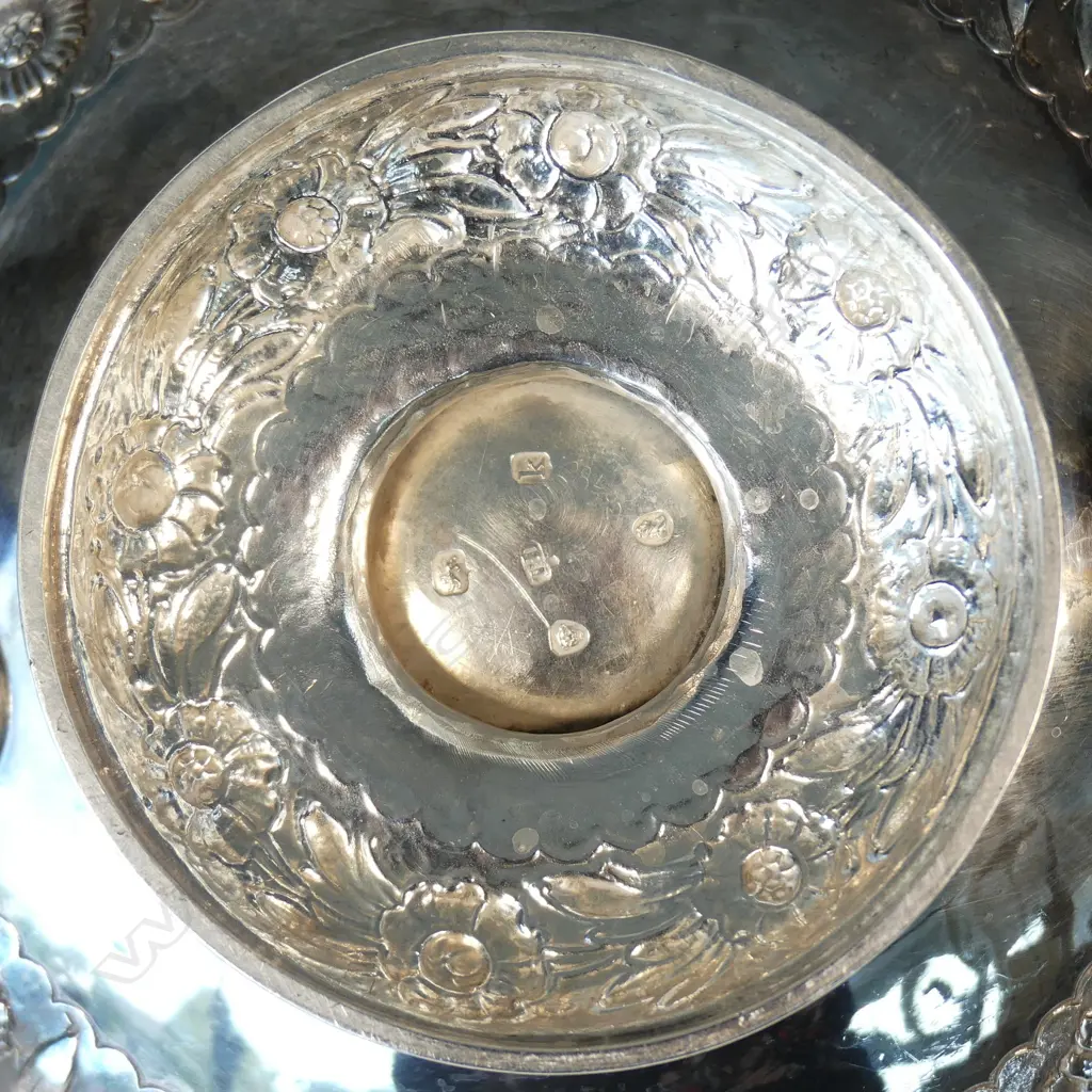 A George IV fancy embossed silver teapot Image 1++