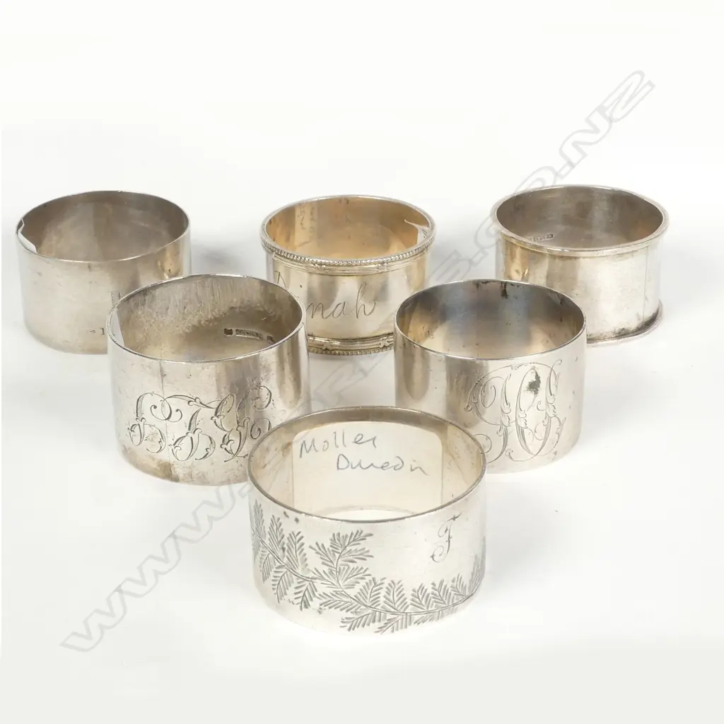 Six NZ silver napkin rings Image 1++