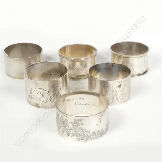 Six NZ silver napkin rings