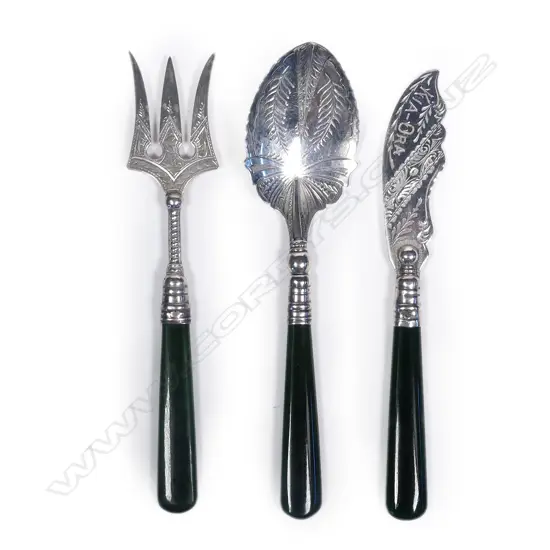 Three New Zealand silver utensils with greenstone handles