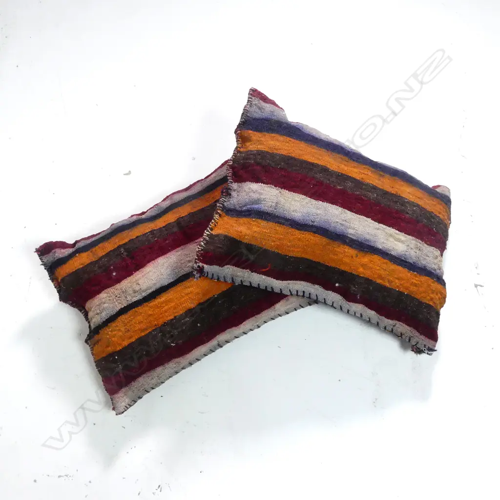 Two cushions made from antique Persian rugs Image 1++