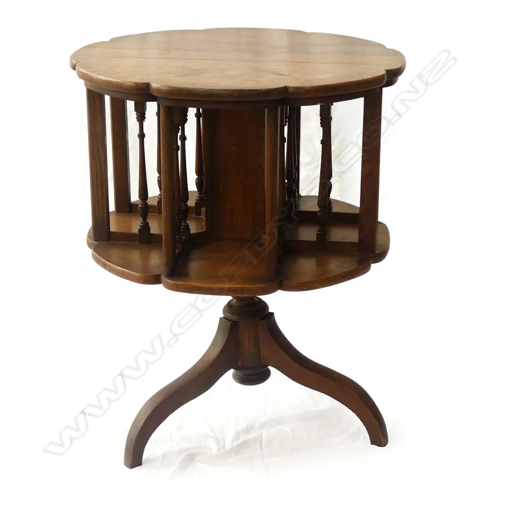 An unusual early 20thC oak revolving bookcase table Image 1++