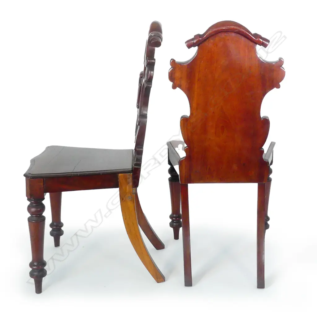 A pair of Victorian mahogany hall chairs Image 1++