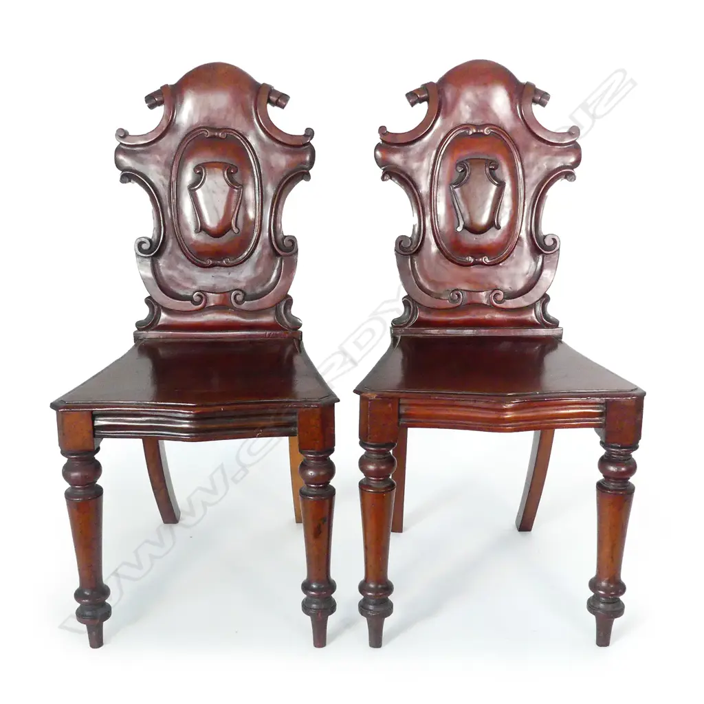 A pair of Victorian mahogany hall chairs Image 1++