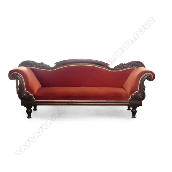 A Victorian scroll arm sofa