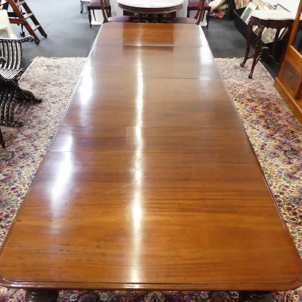 A Victorian mahogany banqueting table Image 1++