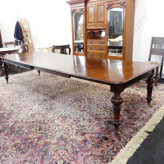 A Victorian mahogany banqueting table