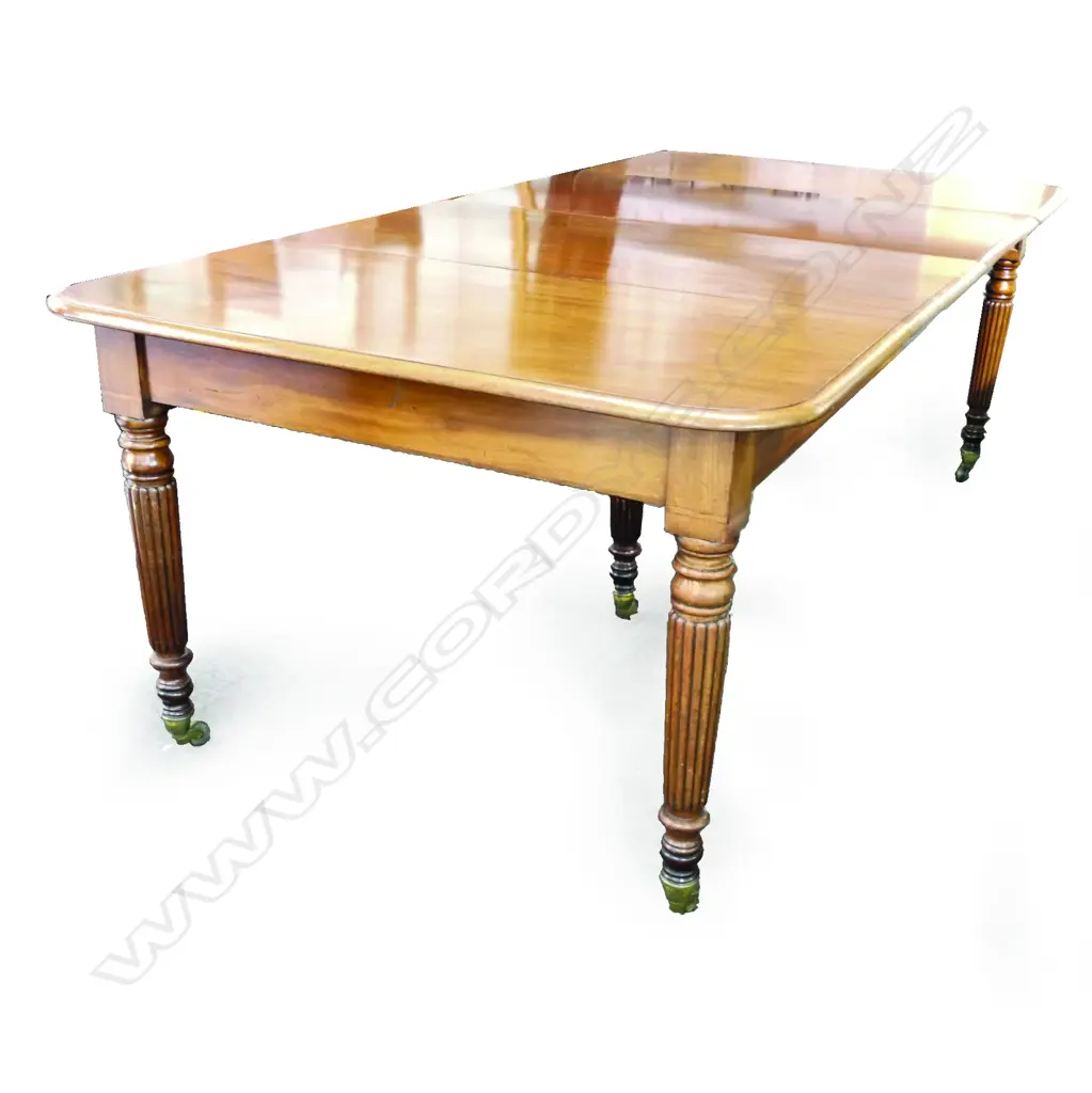 A George III mahogany extension dining table Image 1++