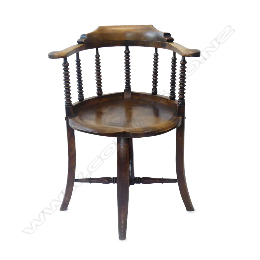 An Edwardian mahogany captain’s chair Image 1++