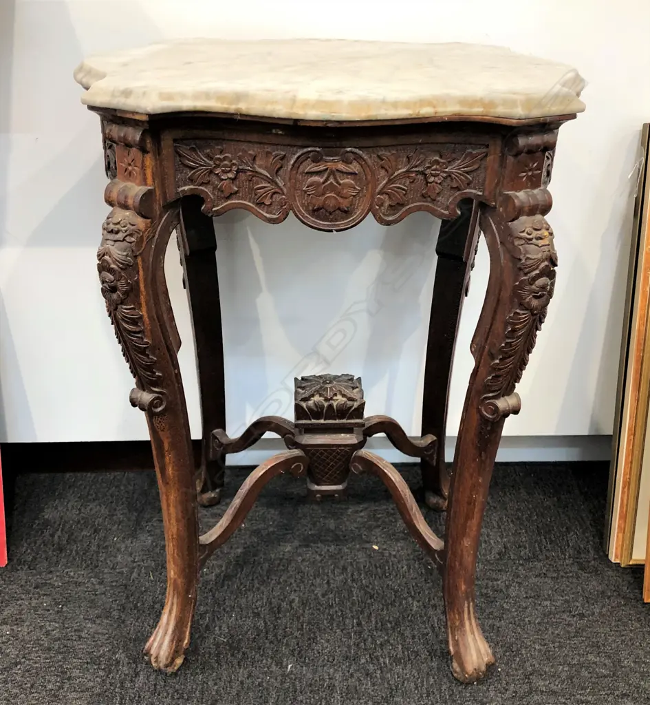 An old carved Chinese occasional table Image 1++